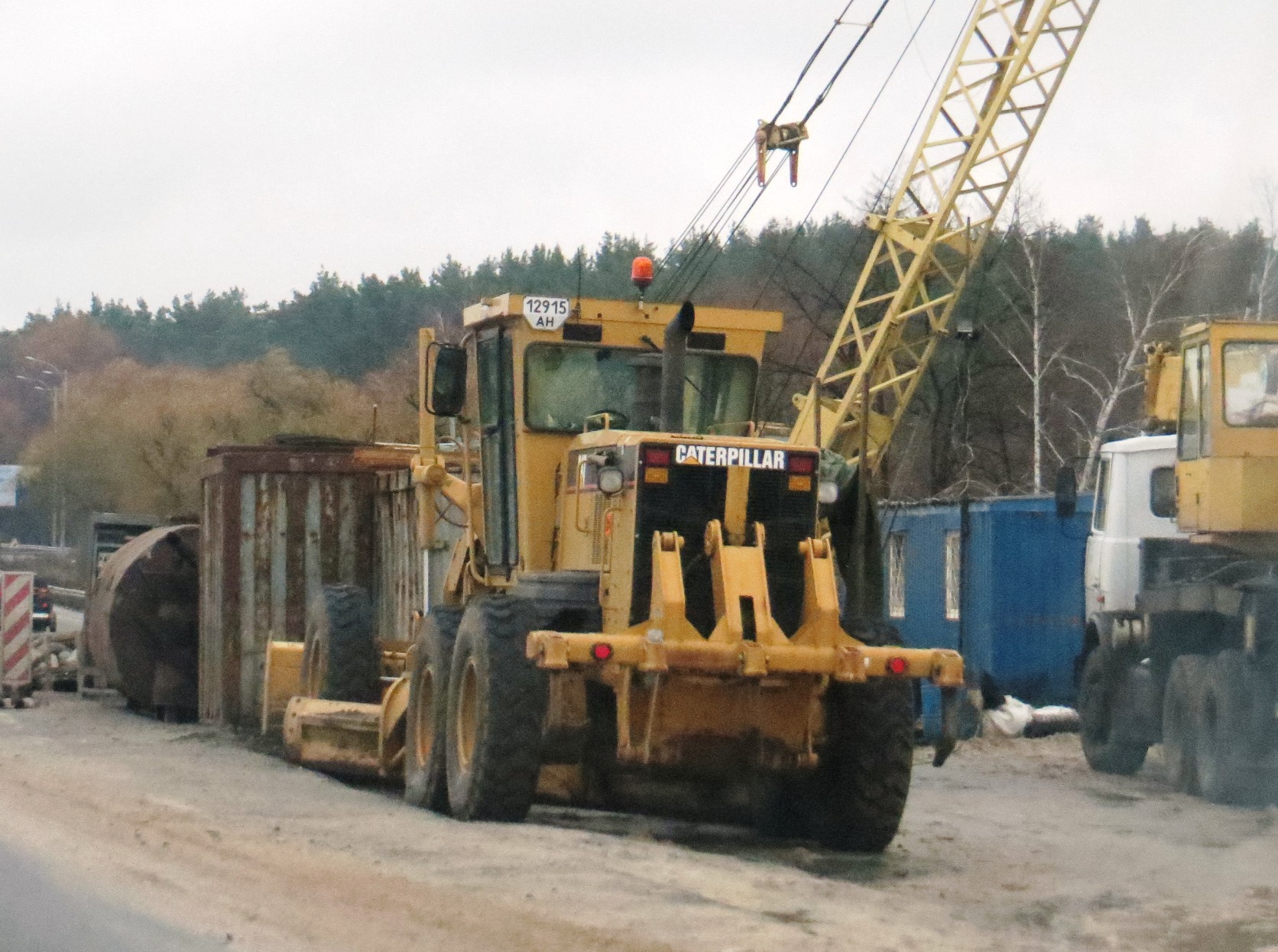 12915 АН, Caterpillar 100 Series 