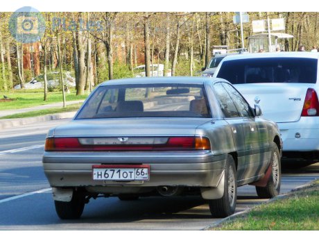 н671от66, Mazda Persona