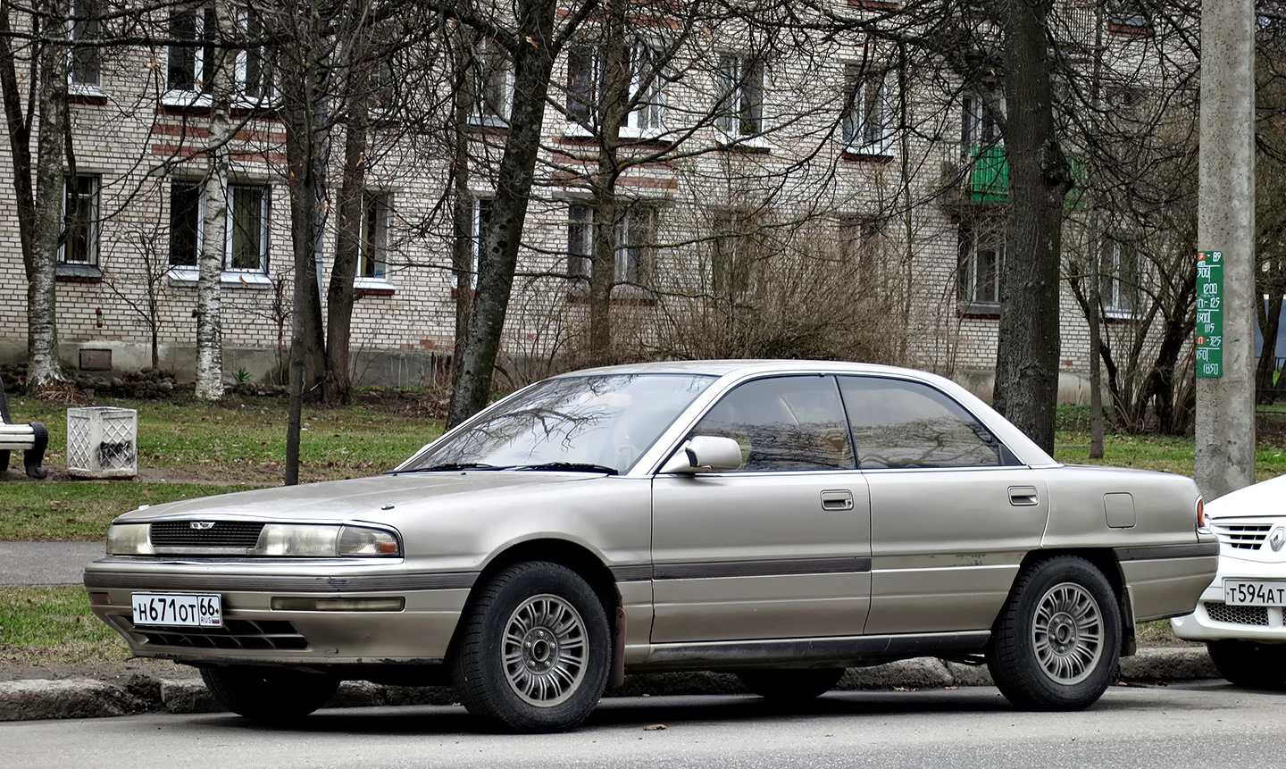 н 671 от 66, Mazda Persona 1st gen (MA), 1988–1992