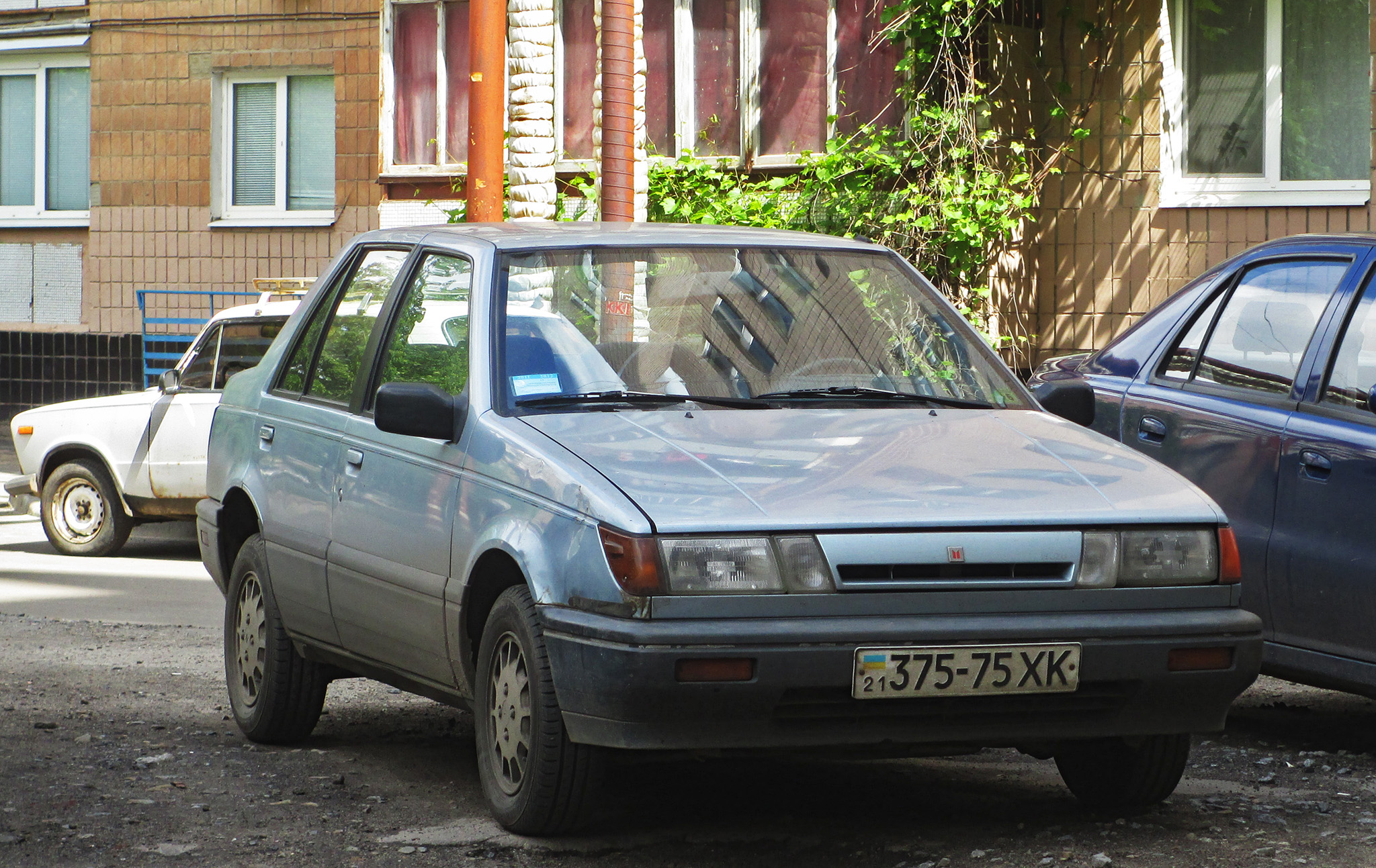 21 375-75 XK, Isuzu I-Mark 