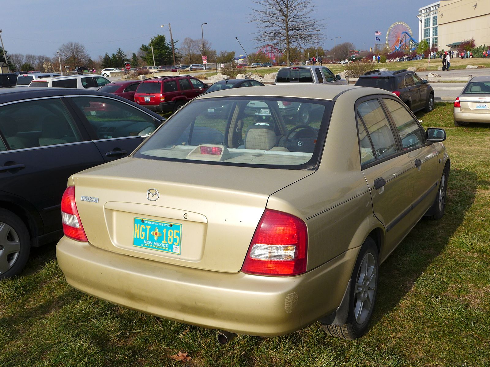 NGT-185, Mazda Protegé 3rd gen Sedan (BJ; NA-market), facelift, 2000–2003