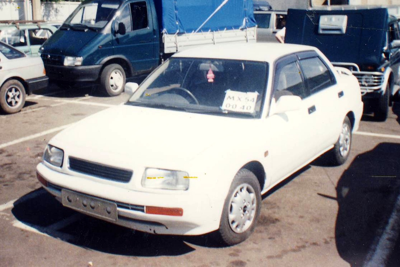 мх 0040 54, Daihatsu Applause 1st gen (A100), 1989–1997