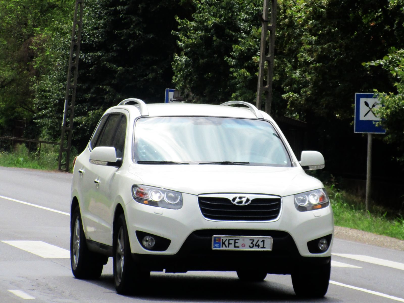 KFE 341, Hyundai Santa Fe 2nd gen (CM), facelift, 2009–2012