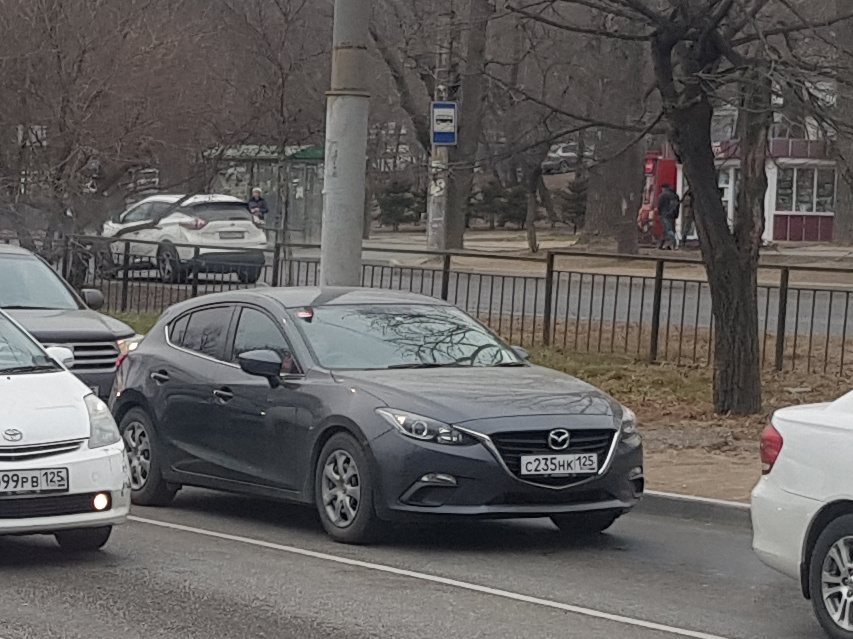 с 235 нк 125, Mazda Axela 