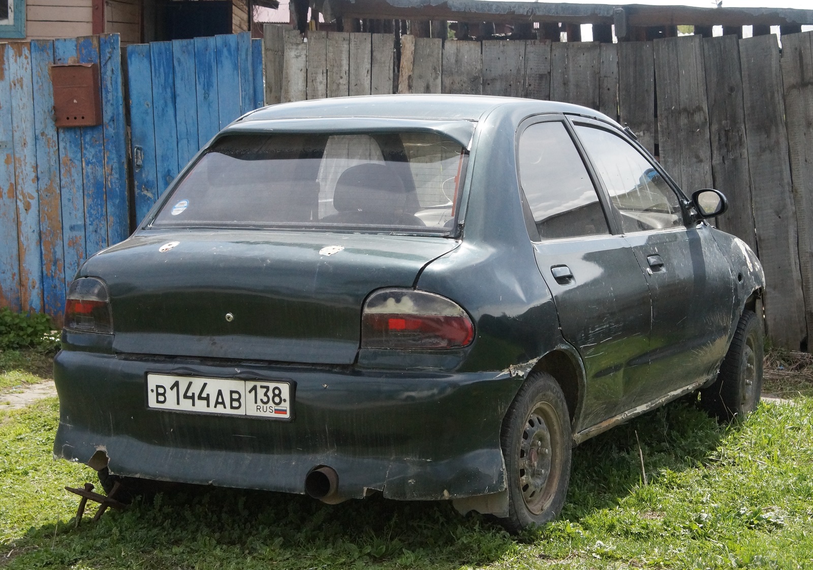 в 144 ав 138, Mazda Revue 1st gen (DB), 1990–1998