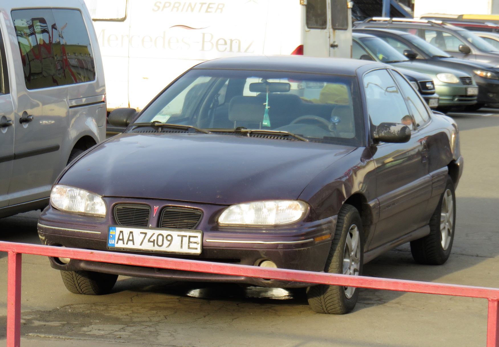 AA 7409 TE, Pontiac Grand Am 4th gen 2-door Coupé (N-body), facelift, 1995–1998