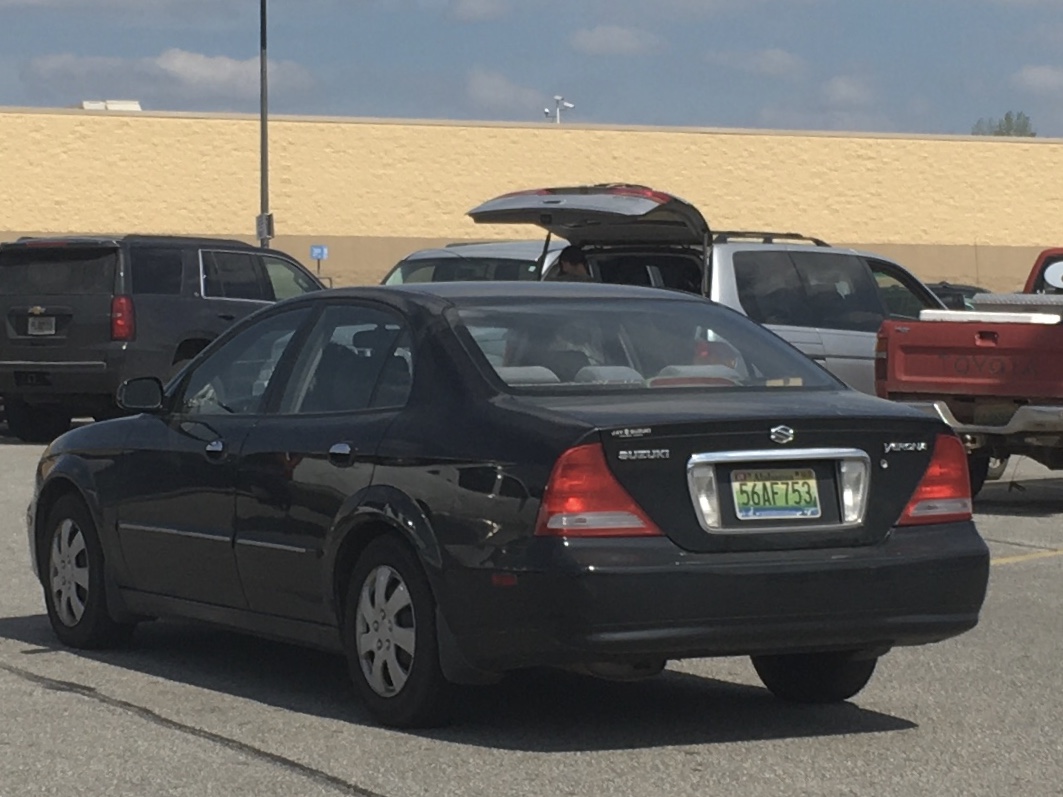 56AF753, Suzuki Verona 1st gen (V200), 2003–2006