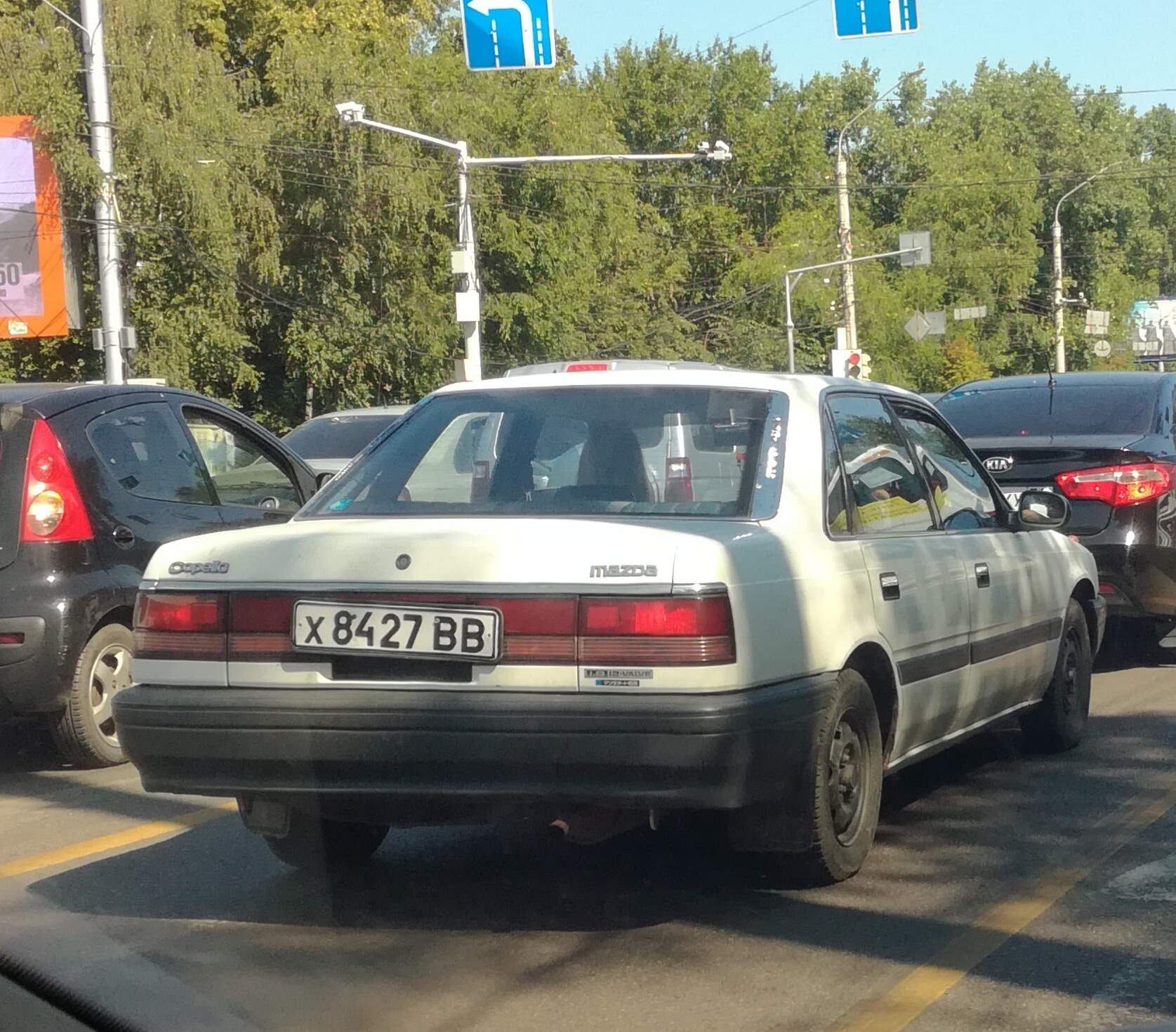 х 8427 ВВ, Mazda Capella 4th gen Sedan (GD), 1987–1992