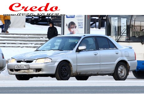 а060хк702, Mazda Protegé