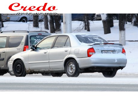 а060хк702, Mazda Protegé