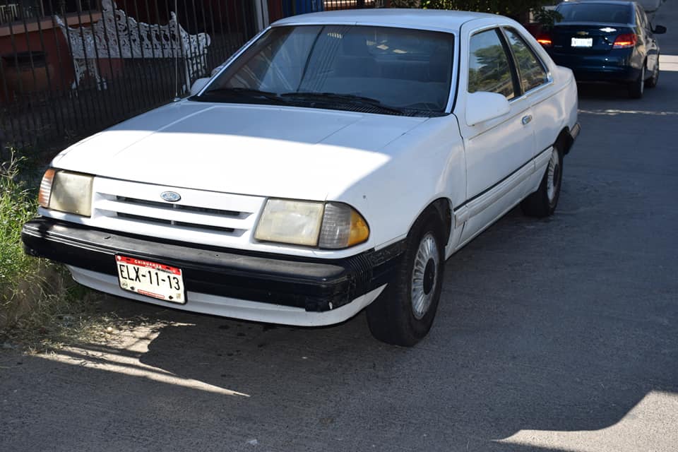 ELX-11-13, Ford Tempo 1st gen 2-door Sedan (66), facelift, 1985–1987