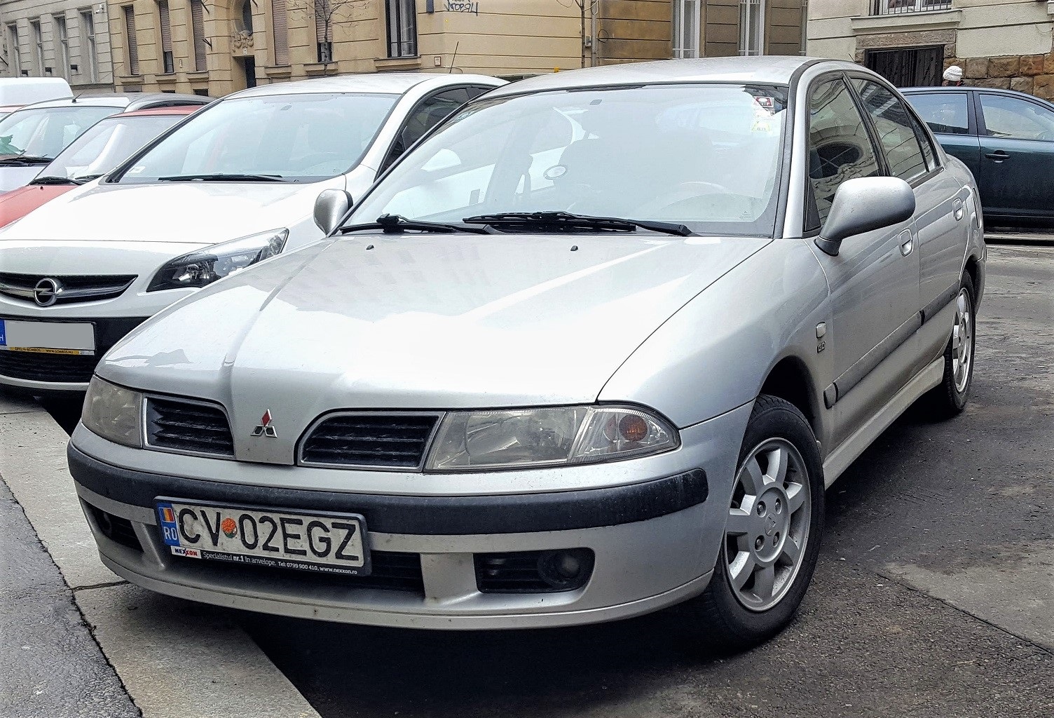 CV 02 EGZ, Mitsubishi Carisma 1st gen Liftback (DA2A), facelift, 1999–2004