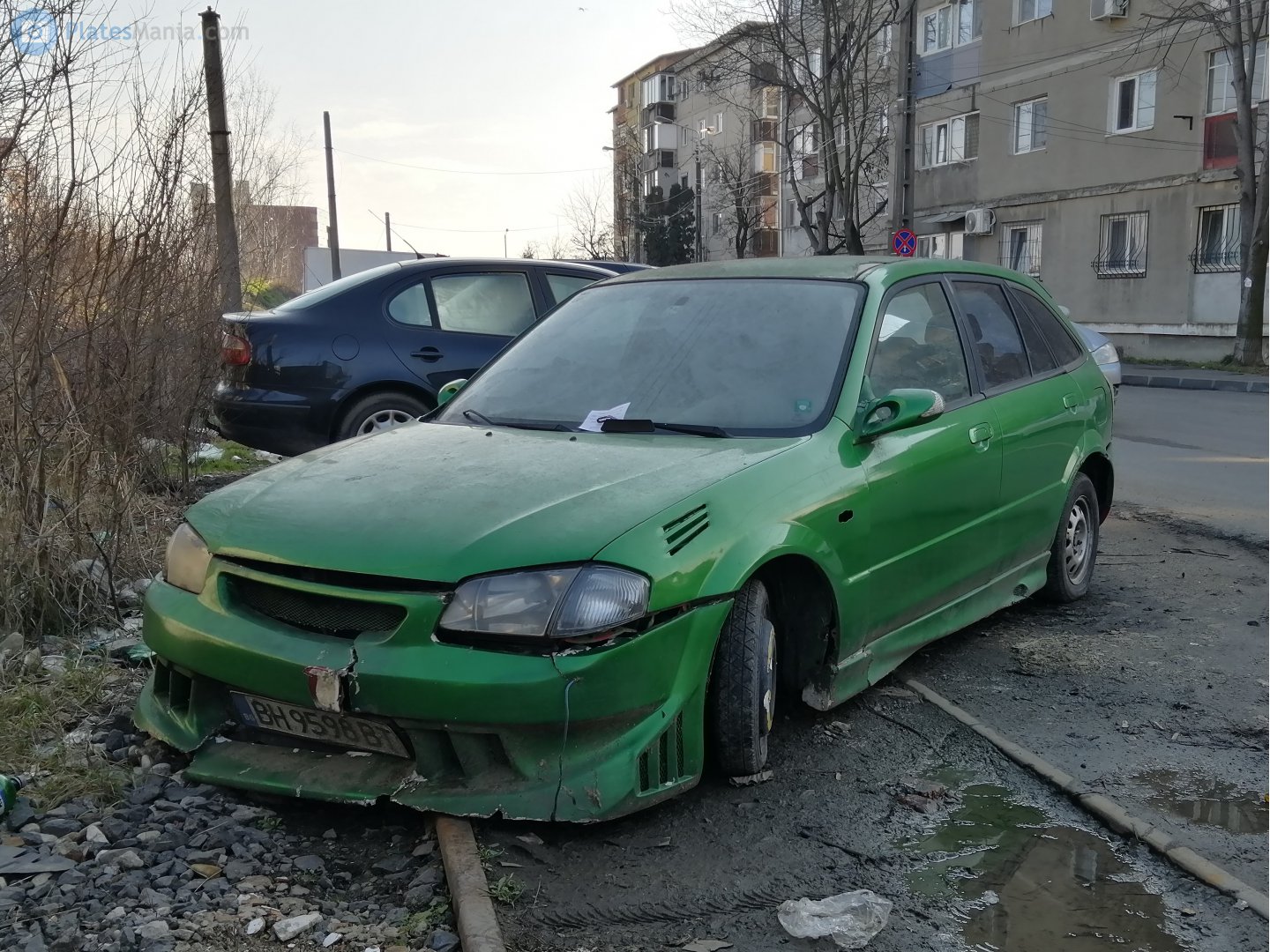 BH 9598 BT, Mazda 323 6th gen Hatch (BJ), 1998–2003