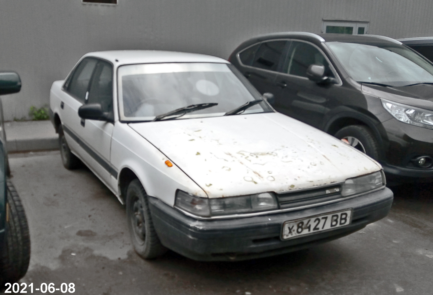 х 8427 ВВ, Mazda Capella 4th gen Sedan (GD), 1987–1992