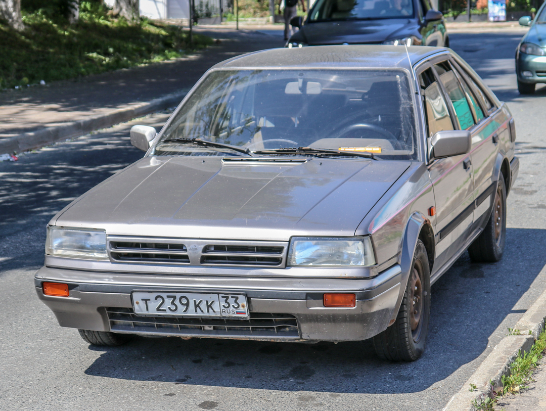 т 239 кк 33, Nissan Bluebird 7th gen Hatch (T12/T72; EU-market), 1985–1990