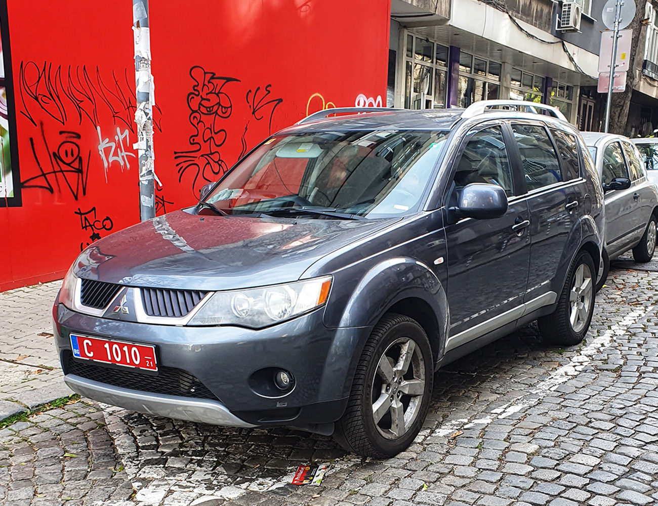 C 1010 21, Mitsubishi Outlander 