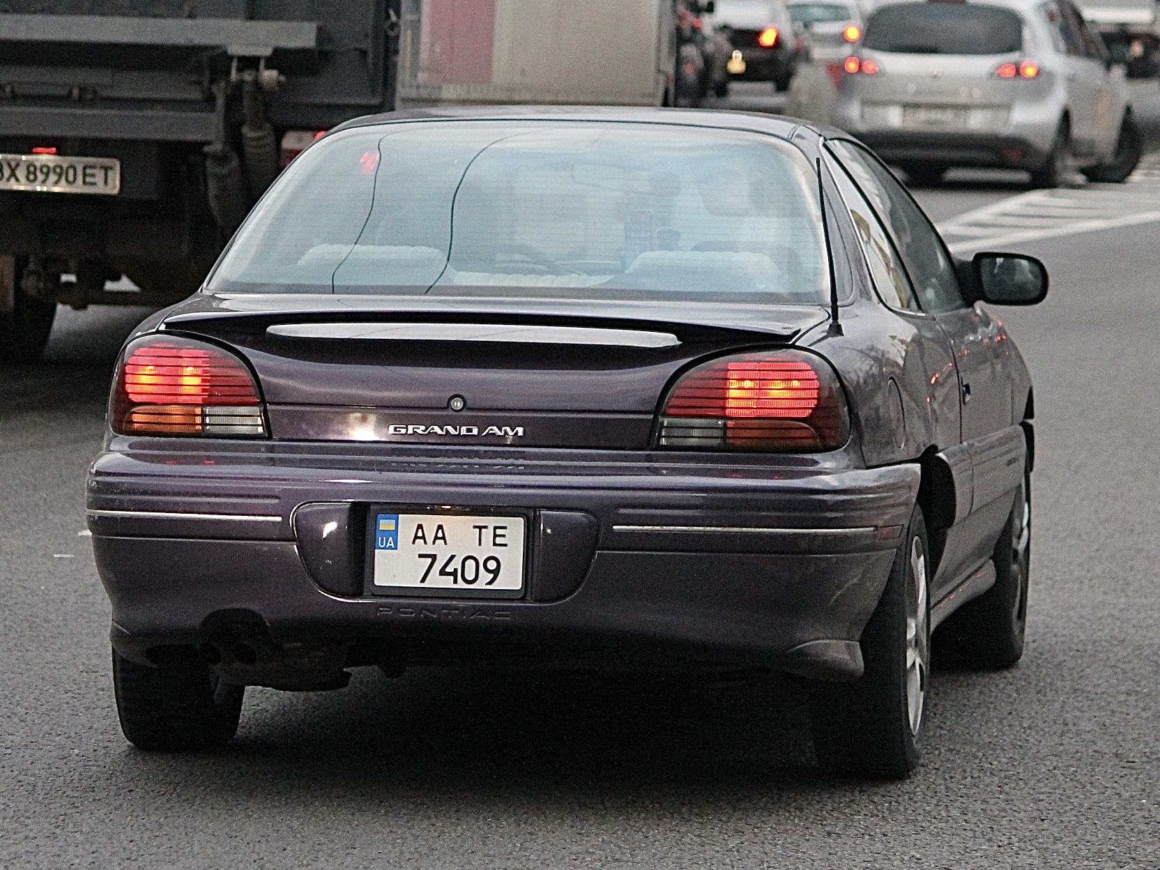 AA 7409 TE, Pontiac Grand Am 4th gen 2-door Coupé (N-body), facelift, 1995–1998