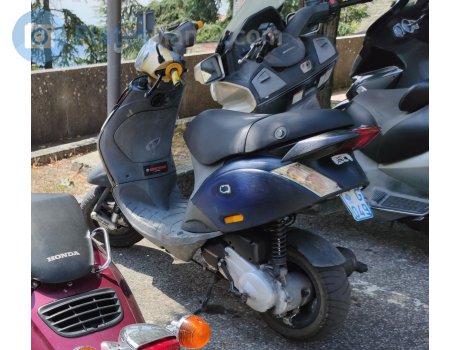 G049, Piaggio Zip