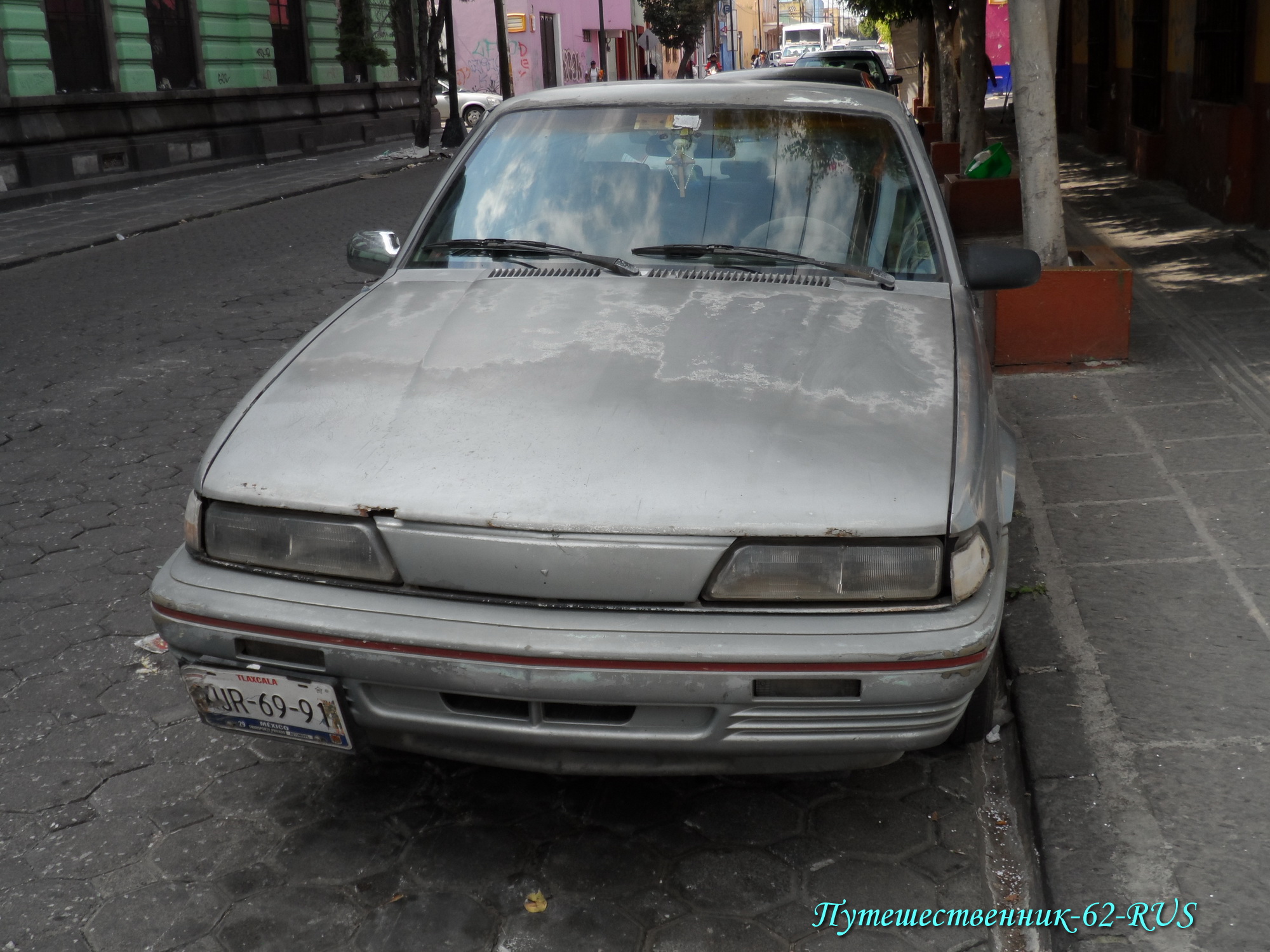 XUR-69-91, Chevrolet Cavalier 2nd gen 4-door Sedan (C69; J-body), facelift, 1990–1994