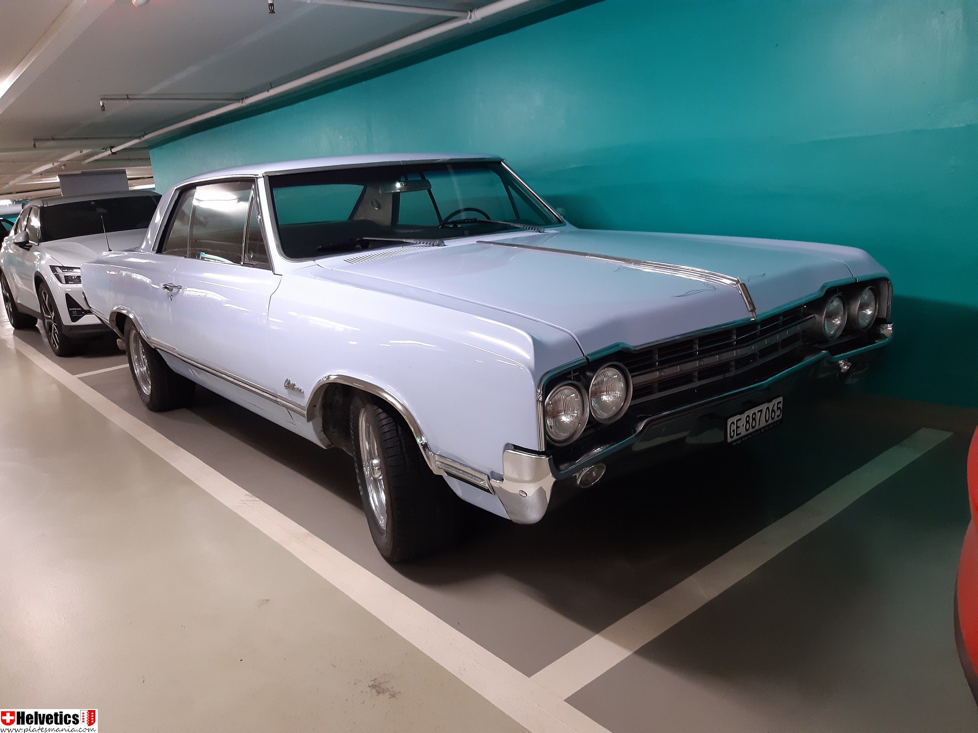 GE 887065, Oldsmobile F-85 2nd gen 1965 Cutlass Holiday Hardtop Coupe, 1st facelift, 1964–1965