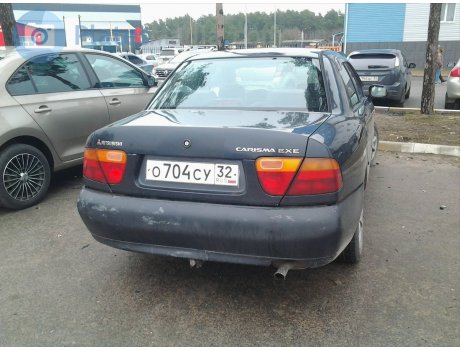 о704су32, Mitsubishi Carisma