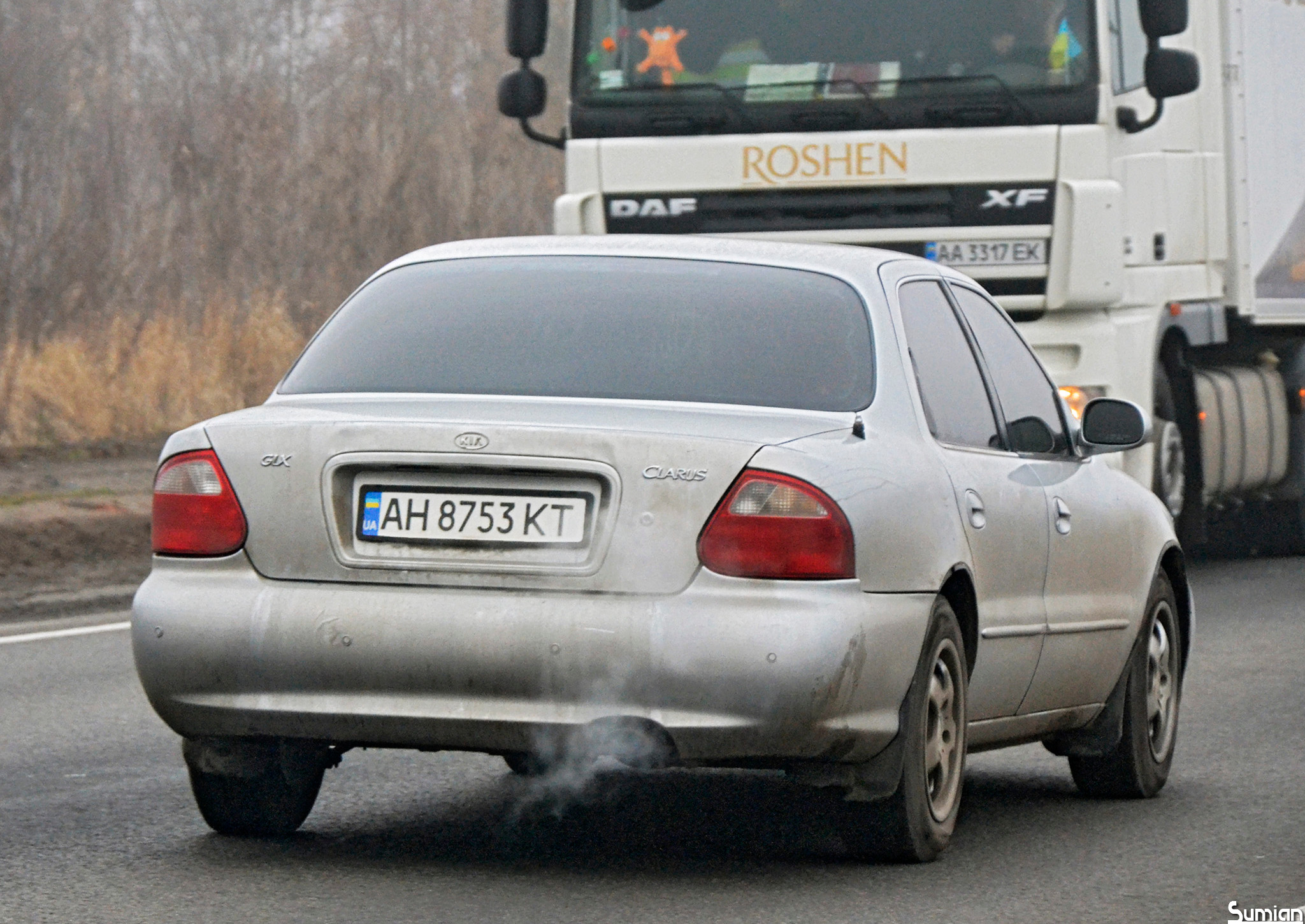 AH 8753 KT, Kia Clarus 1st gen Sedan (GC), facelift, 1998–2001