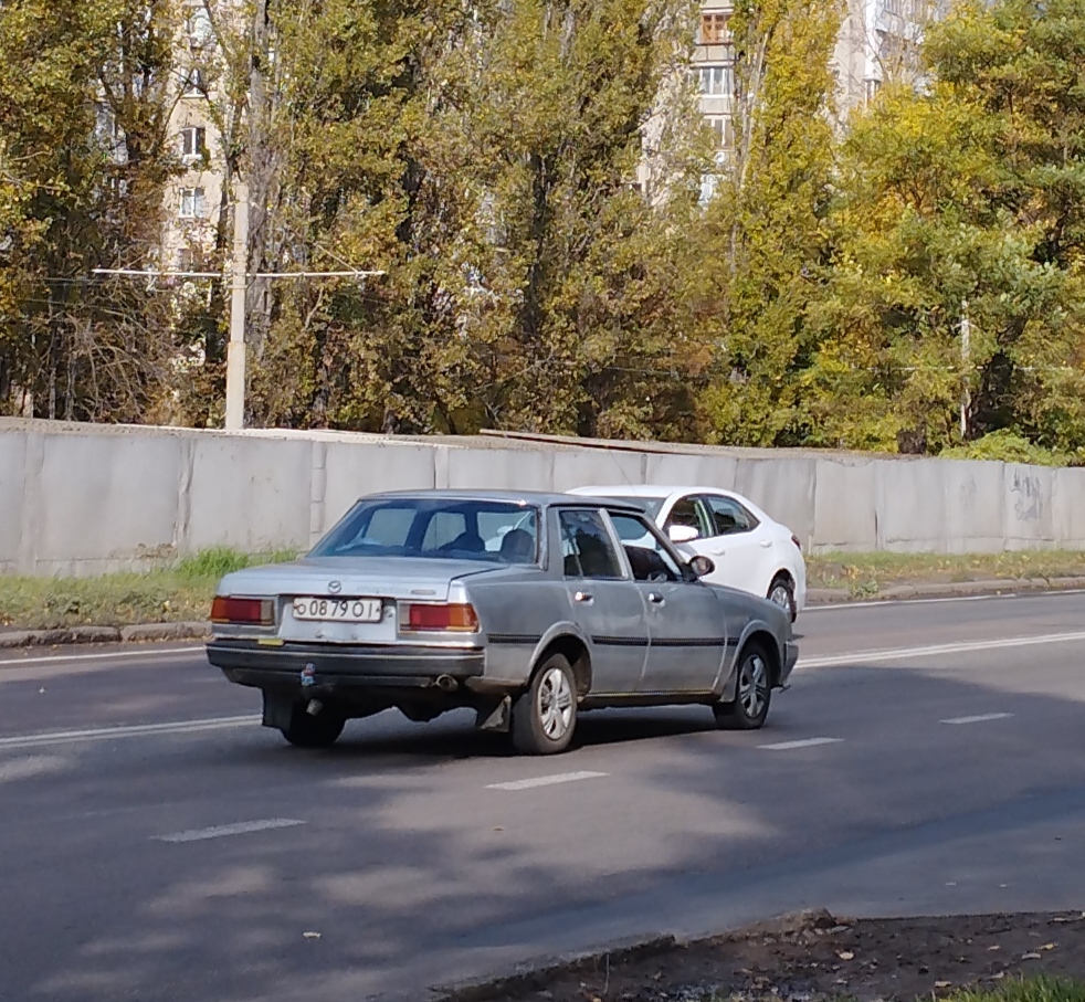 о 0879 ОІ, Mazda Capella 2nd gen Sedan (CB), 1978–1985