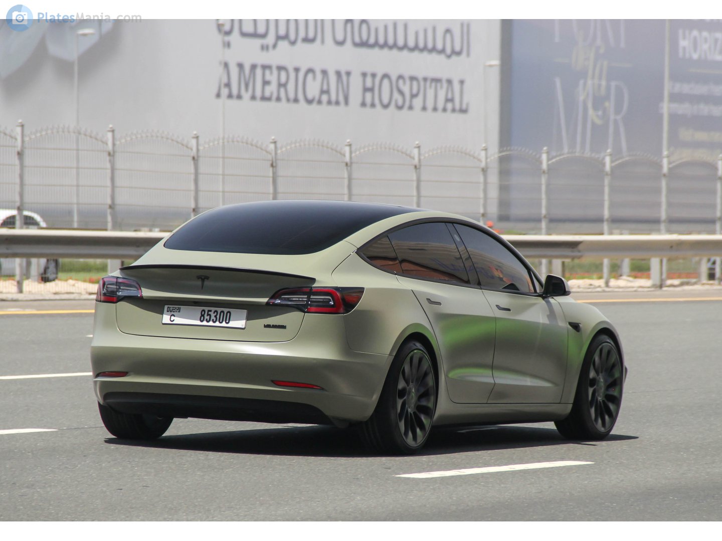 "C 85300" photos Tesla Model 3. UAE