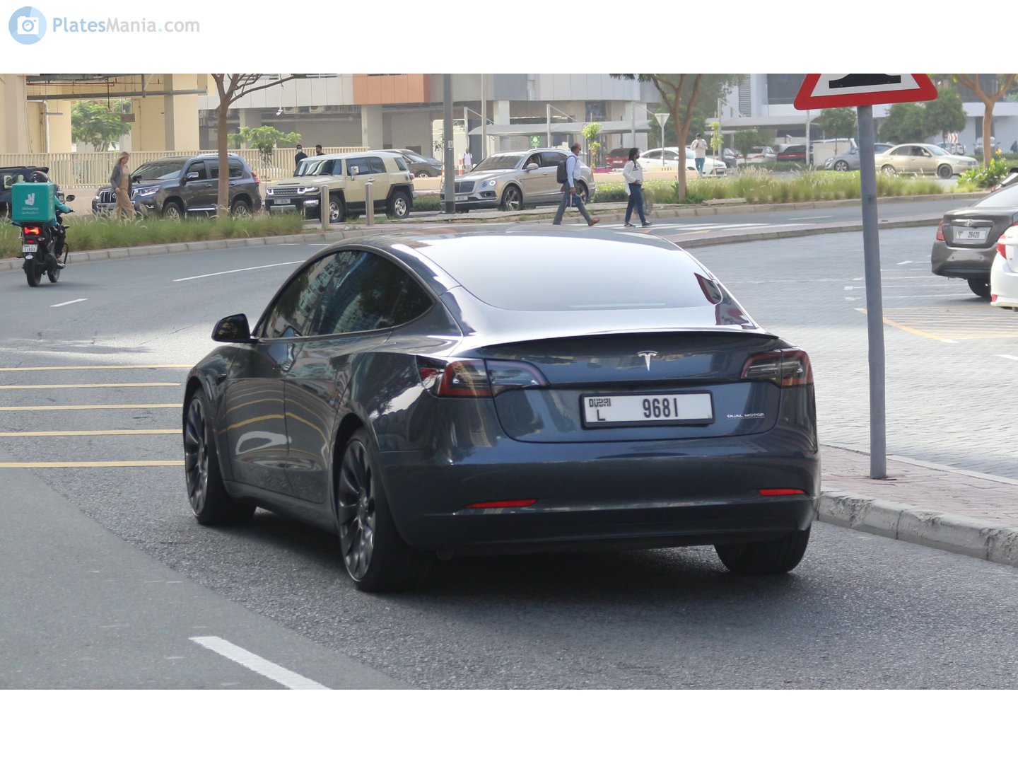 "L 9681" photos Tesla Model 3. UAE