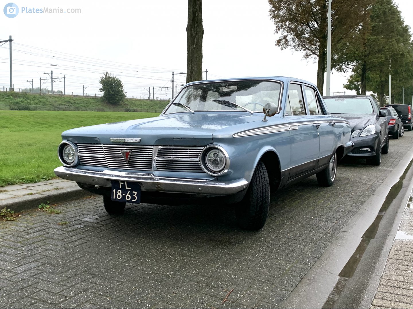 FL-18-63, Plymouth Valiant 2nd gen 1965 4-door Sedan (AV1/AV2; A-body), 2nd facelift, 1964–1965