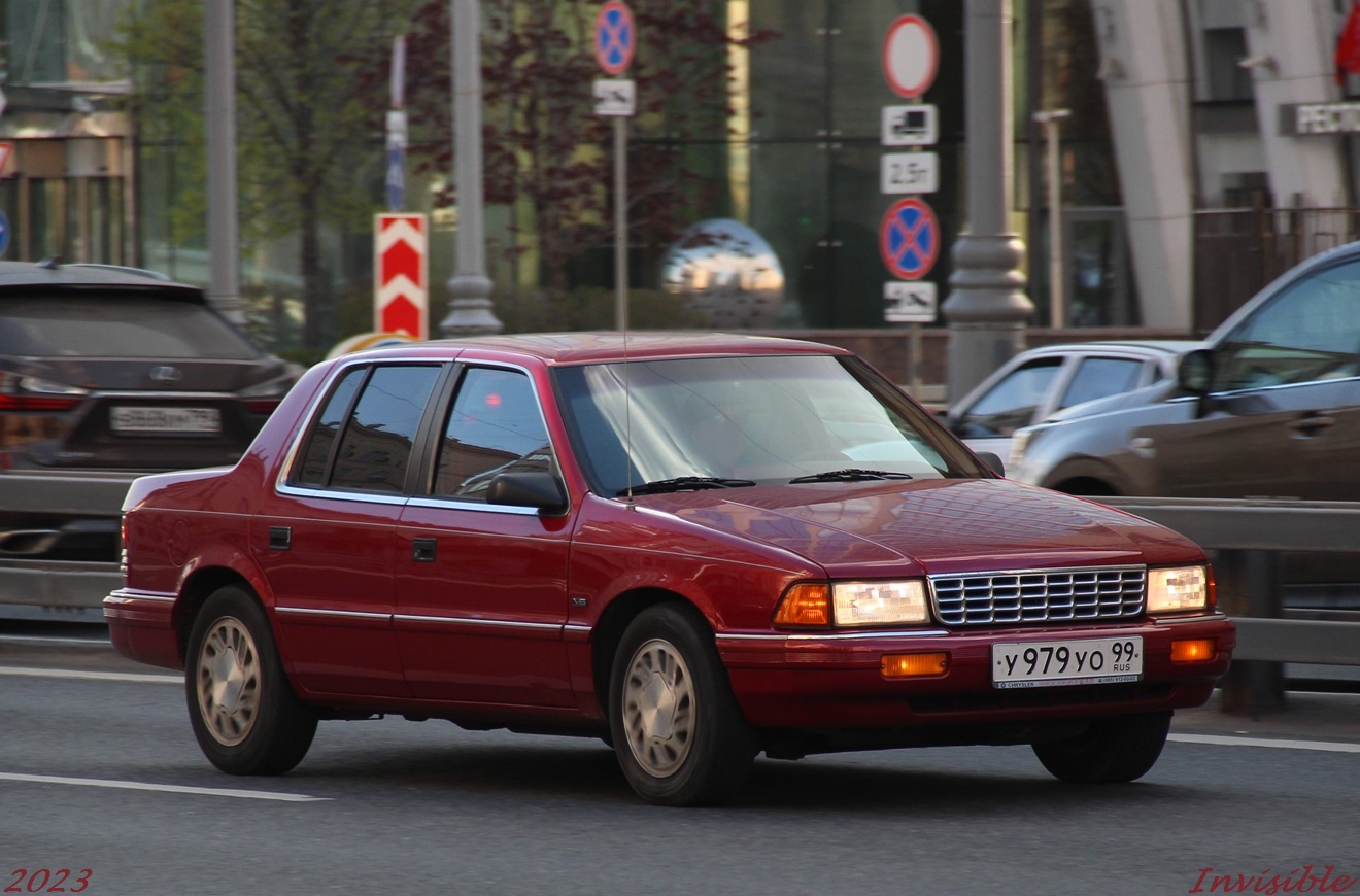 у 979 уо 99, Plymouth Acclaim 1st gen (AA-body), 1989–1994