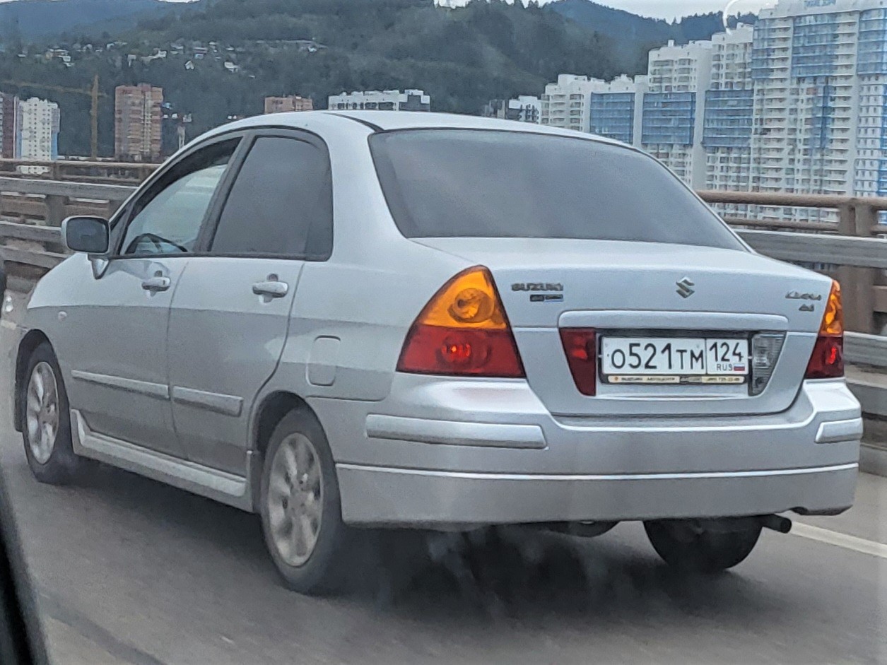 о 521 тм 124, Suzuki Liana 1st gen Sedan (RH), 2001–2007 (–2014 for PK-market)