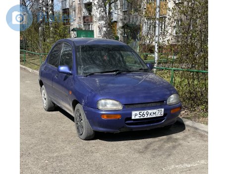 р569км70, Mazda Revue
