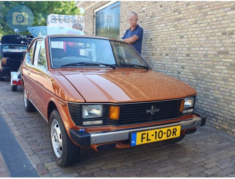 FL-10-DR, Suzuki SC100