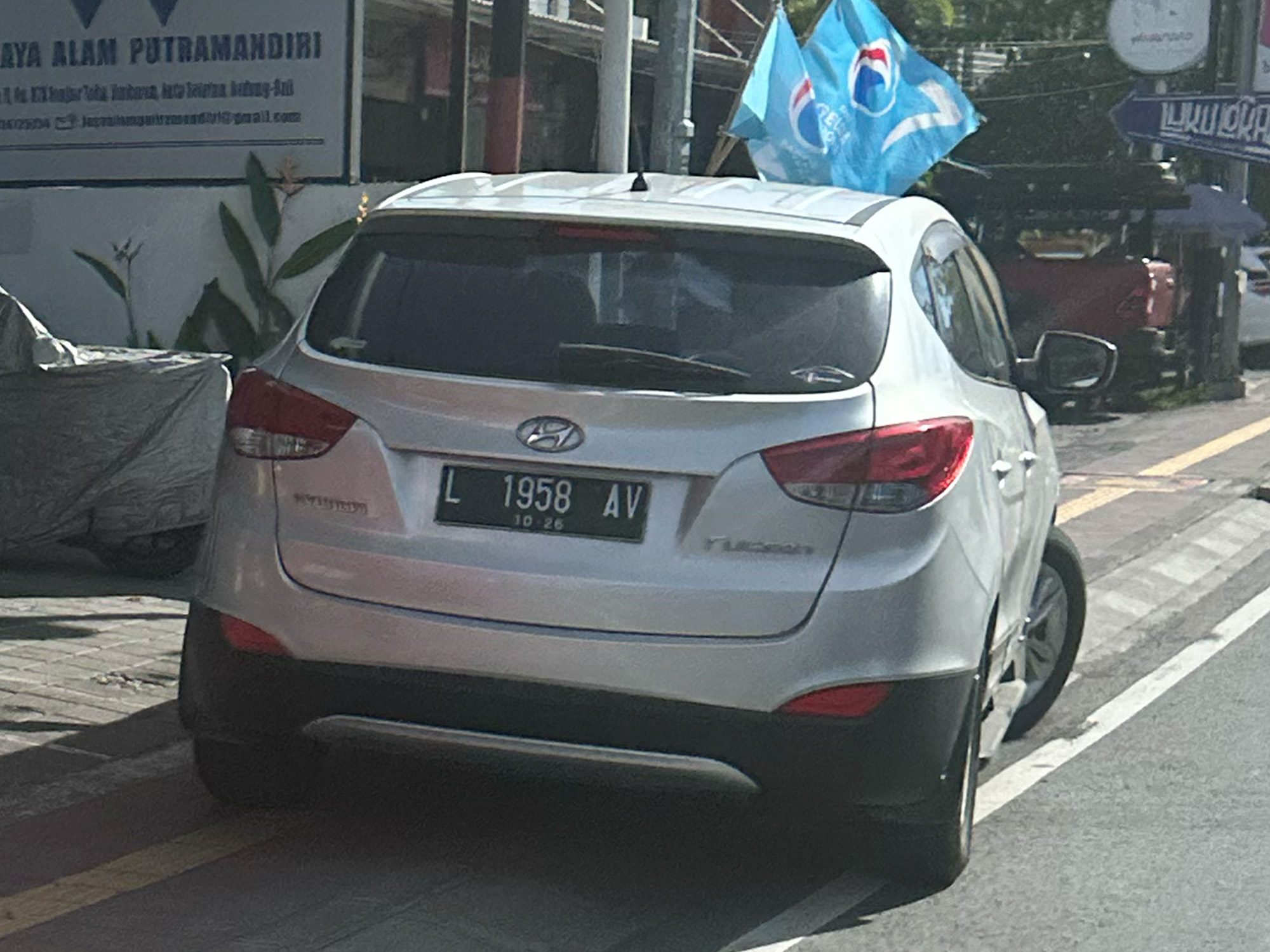 L 1958 AV, Hyundai Tucson 2nd gen (LM), 2009–2018