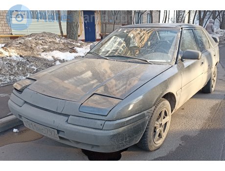 т911нс797, Mazda 323
