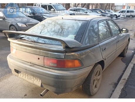 т911нс797, Mazda 323