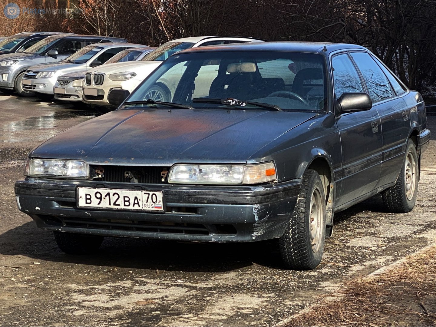 в 912 ва 70, Mazda Capella 4th gen Hatch (GD), 1987–1992