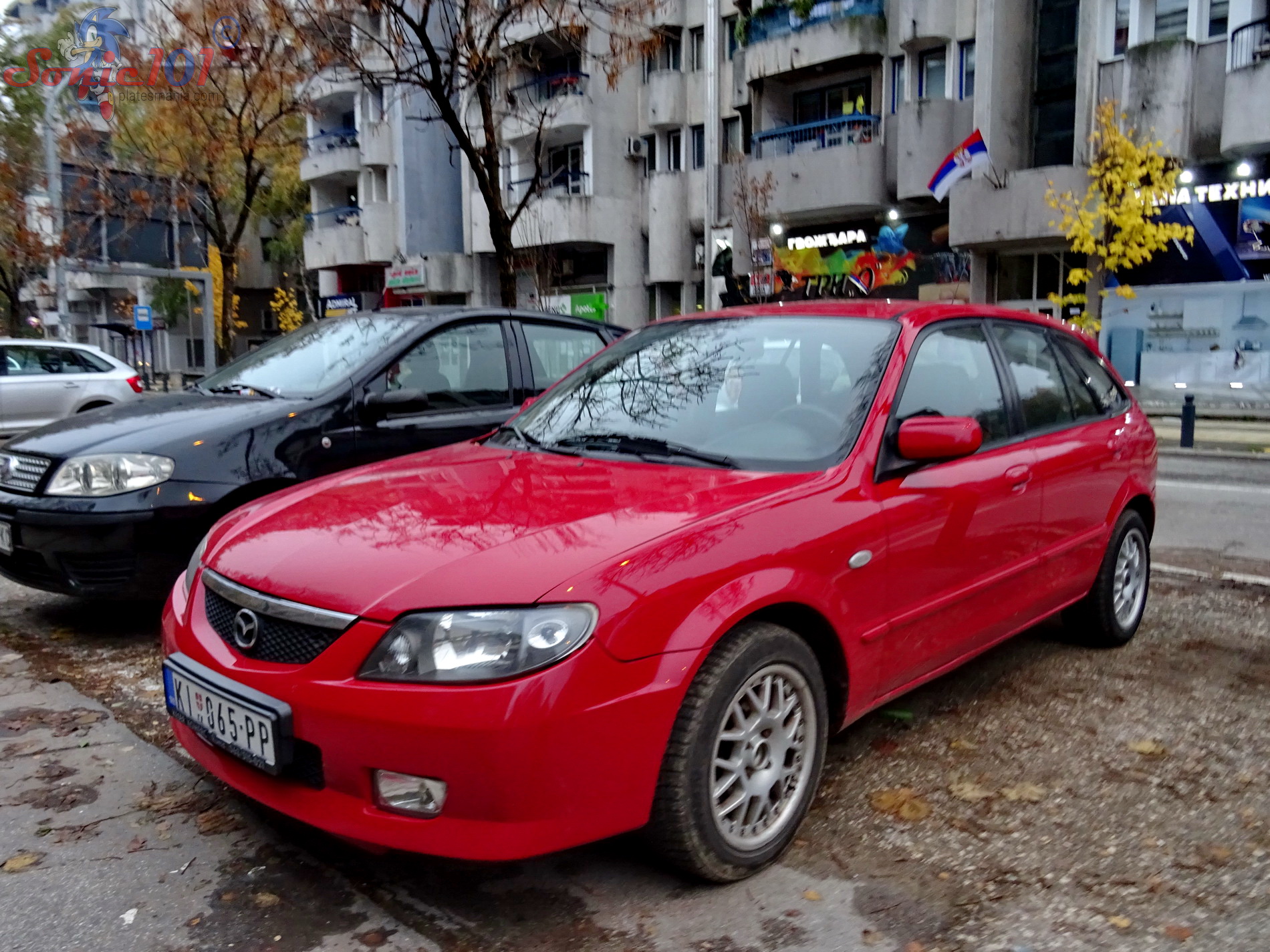 KI 065-PP, Mazda 323 6th gen Hatch (BJ), 1998–2003