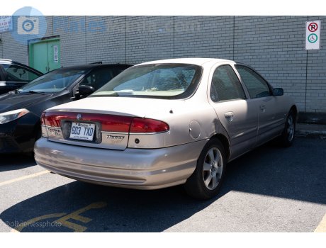 603 TXD, Mercury Mystique