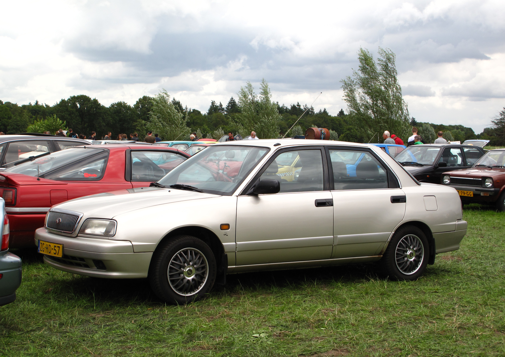 ZG-HD-57, Daihatsu Applause 1st gen (A100), facelift, 1997–2000