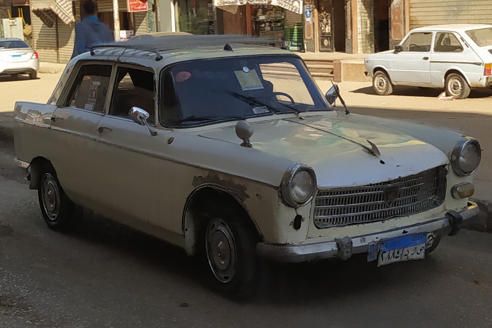 ٢٨٨٤ دوص, Peugeot 404 Sedan, 1960–1975
