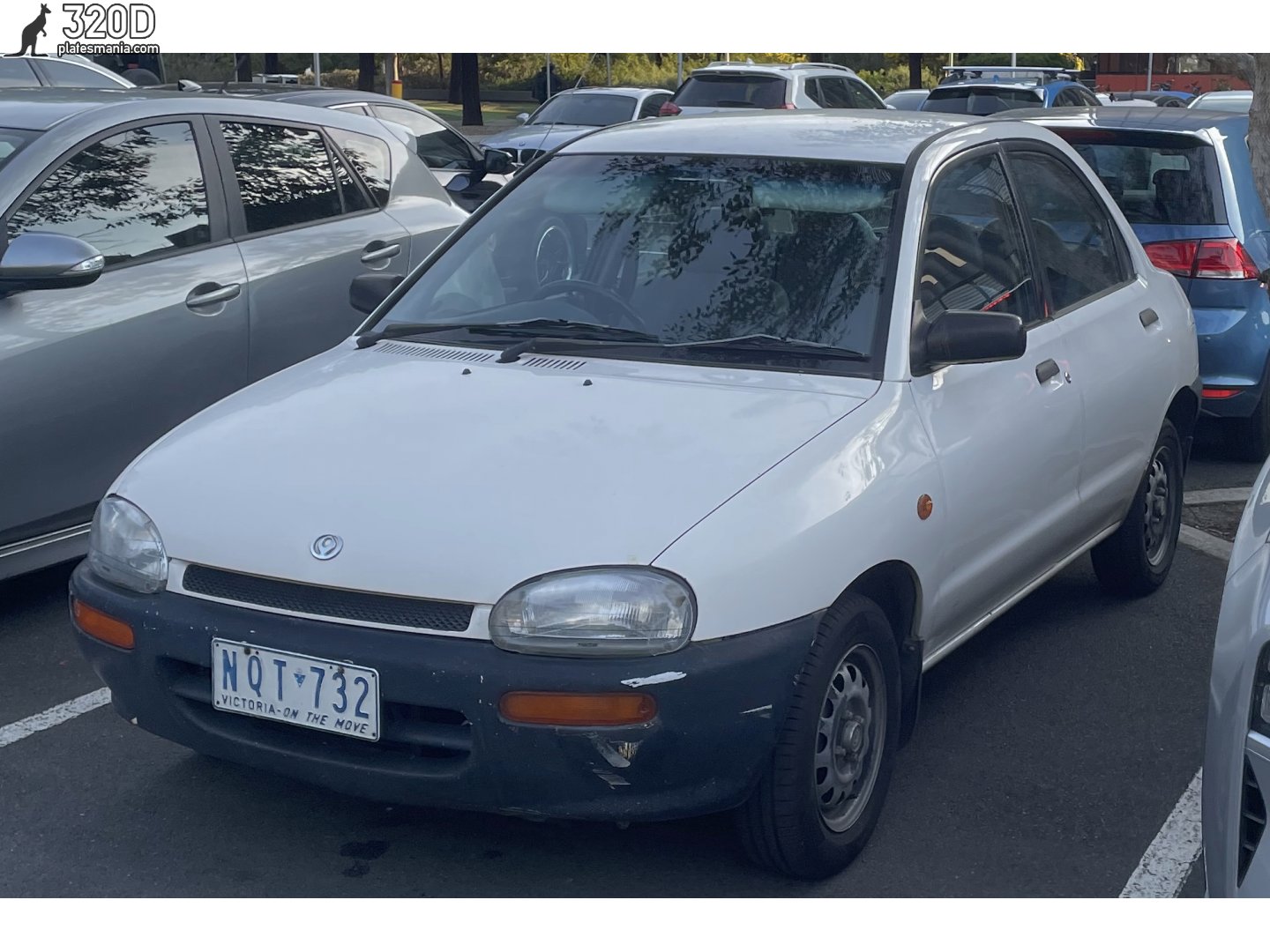 NQT-732, Autozam Revue 