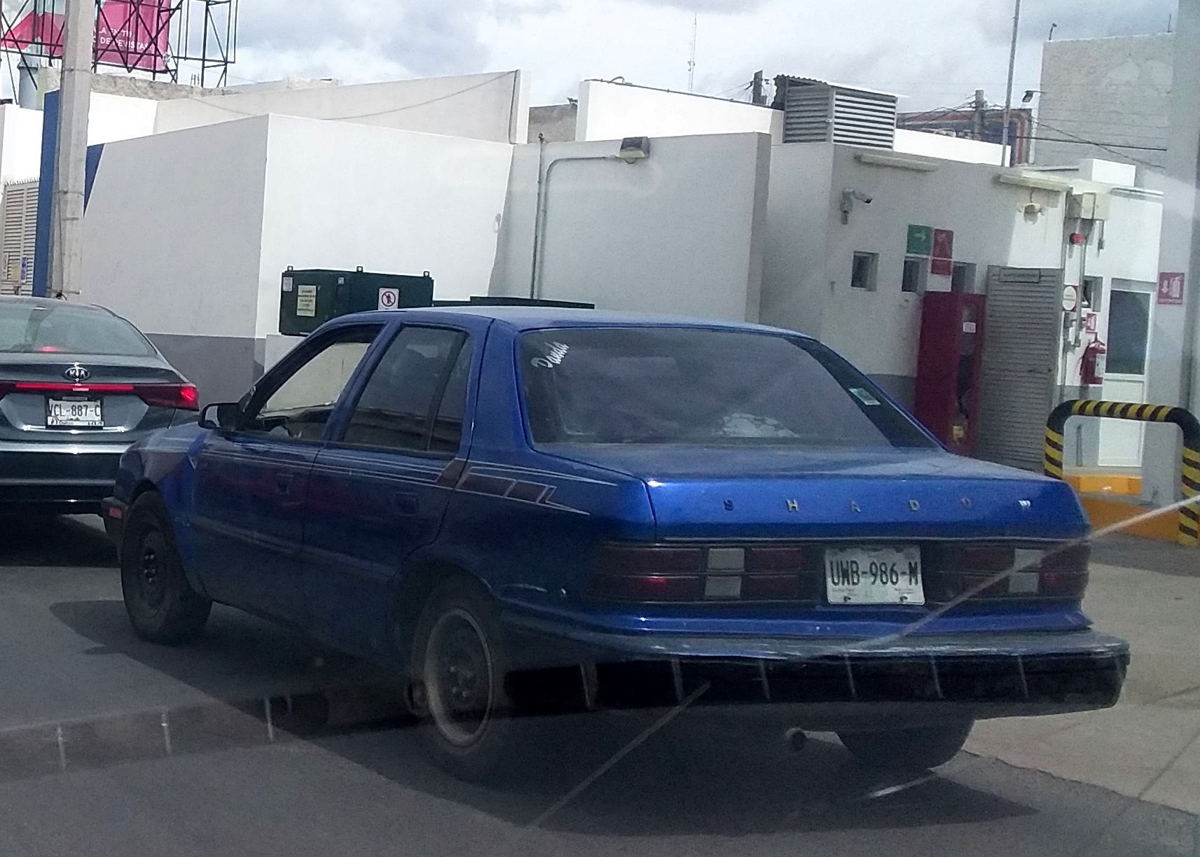 UWB-986-M, Dodge Shadow 1st gen 4-door Sedan (44; P-body), facelift, 1988–1994