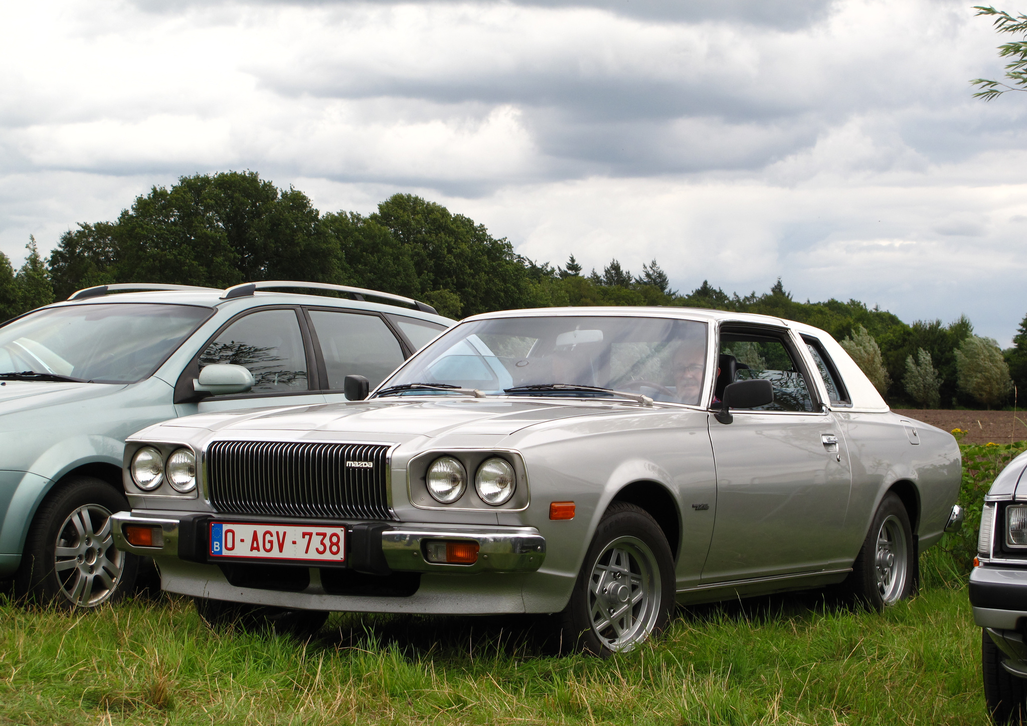 O-AGV-738, Mazda 121 Cosmo rebadge (CD), 1975–1981