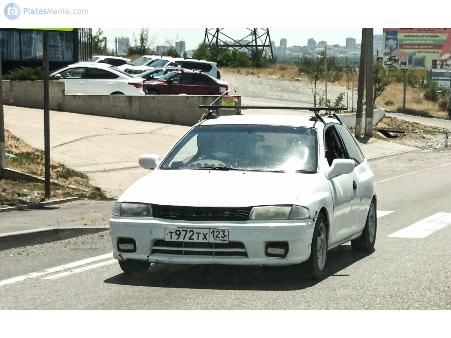 т 972 тх 123, Mazda Familia 7th gen Hatch (BH), 1996–1998