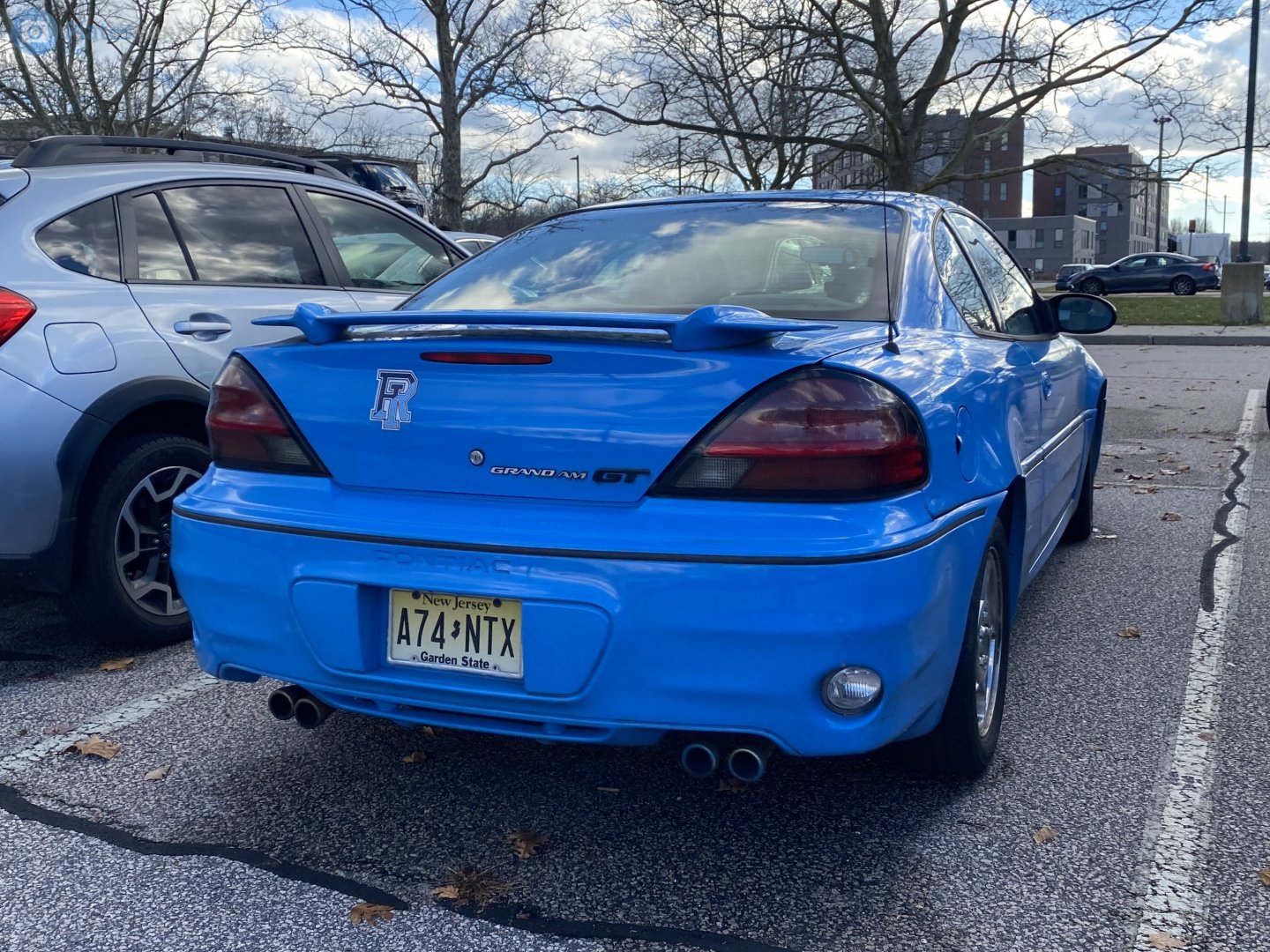 A74-NTX, Pontiac Grand Am 5th gen 2-door Coupé (GMX310), 1998–2005