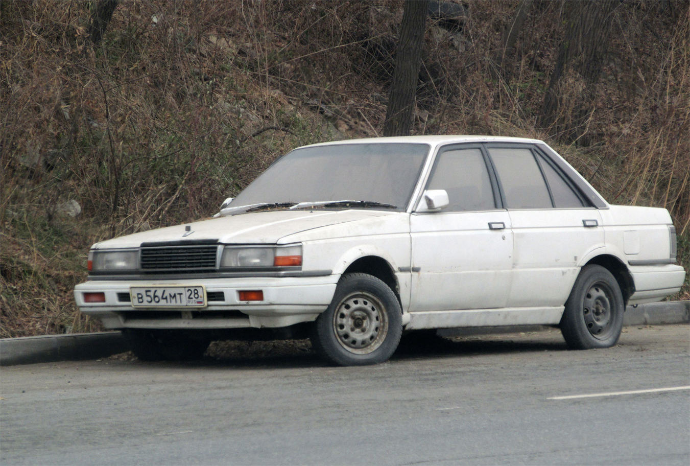в 564 мт 28, Nissan Laurel Spirit 2nd gen (B12), 1986–1990