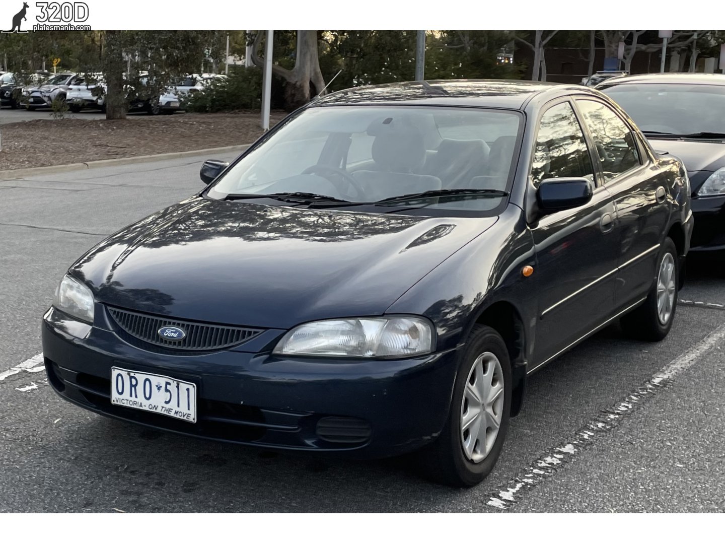 ORO-511, Ford Laser 4th gen Sedan (KJ/KL/KM), 1994–1999