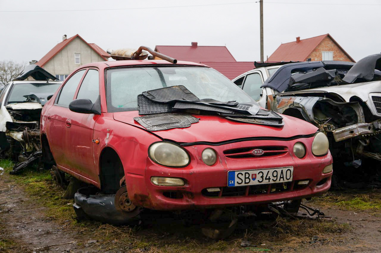 SB-349AO, Kia Shuma 1st gen (S-II), 1997–2001